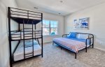 Bedroom 4  1 3 tier bunk bed and a king bed. Sleeps 5, 3 Adults Max on second floor